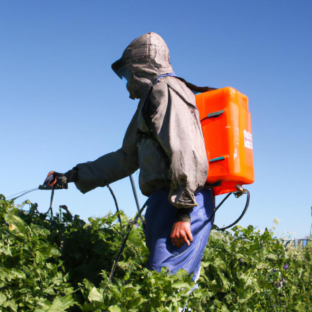 Person spraying organic pesticide outdoors